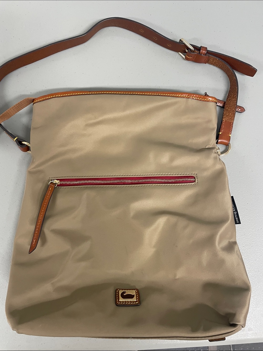 Dooney & Bourke Beige Nylon Crossbody with Brown Leather Trim and Red Zip